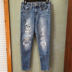 American Eagle, skinny, jeggings with rips. Size: 4